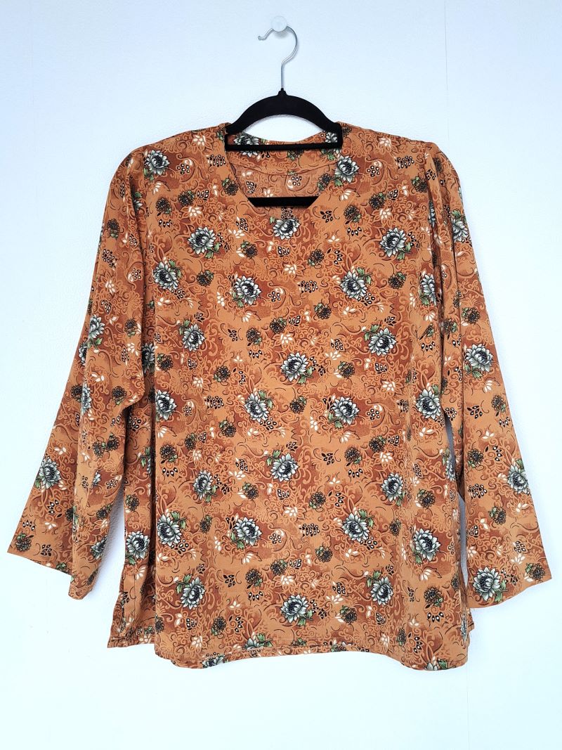 bruine blouse met bloemenprint