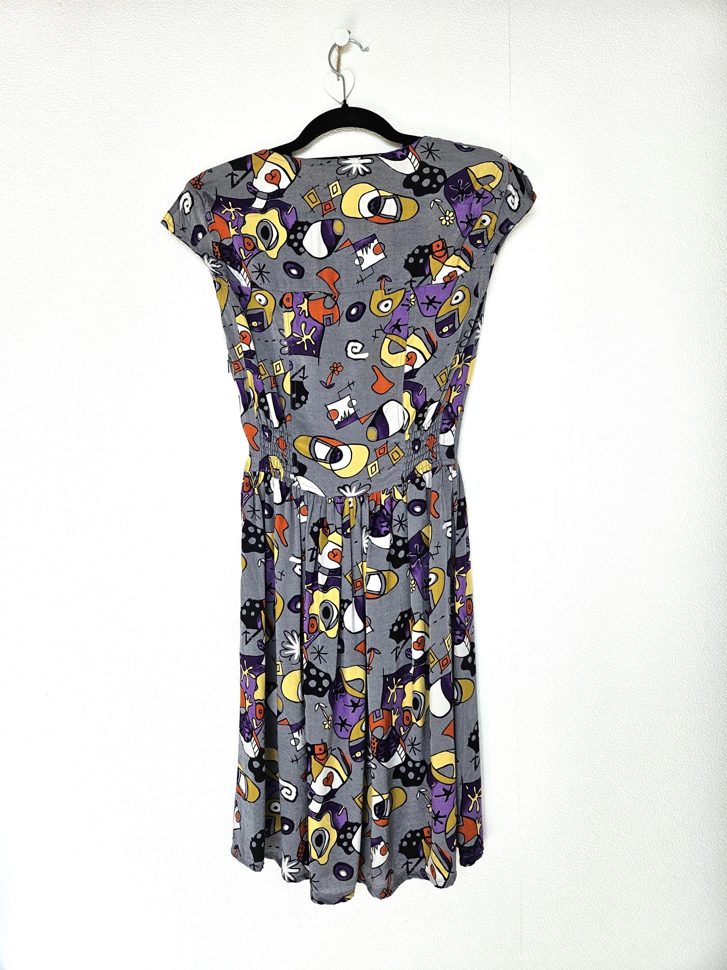 Grijze vintage jurk met funky print | XS