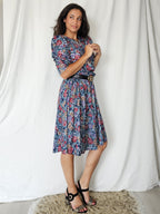 Donkerblauwe vintage jurk met bloemenprint | M
