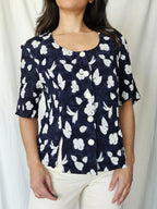 Donkerblauwe vintage top met witte bloemen | M