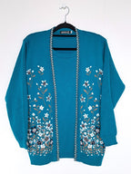 blauwe trui met bloemen