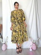 Zwierige gele vintage jurk met zwart patroon | L