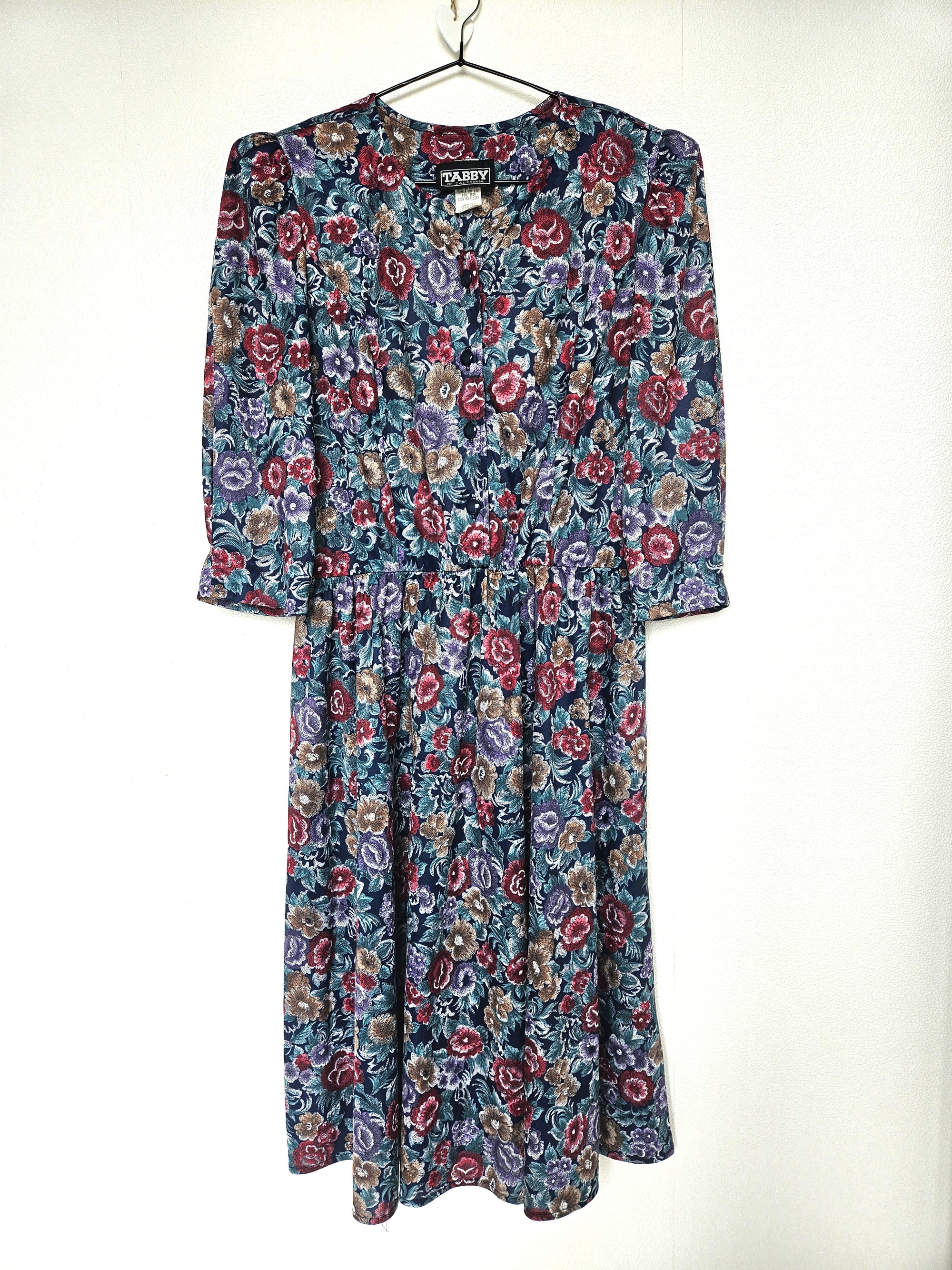 Donkerblauwe vintage jurk met bloemenprint | M