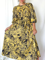 Zwierige gele vintage jurk met zwart patroon | L