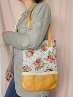 Vintage schoudertas met bloemen