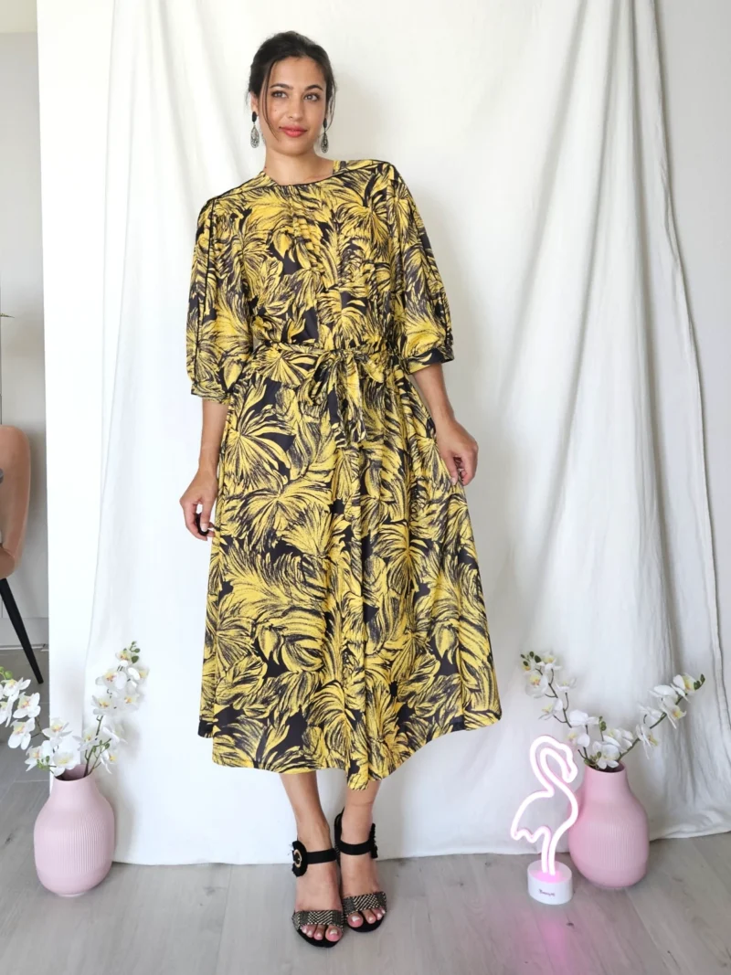 Zwierige gele vintage jurk met zwart patroon | L